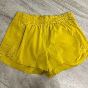 Athleta gold athletic shorts